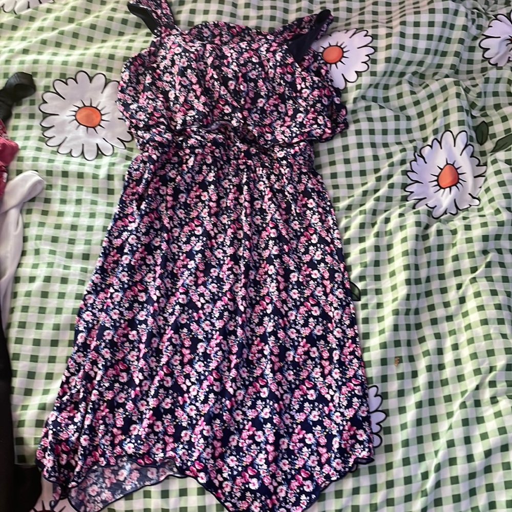 Dress has loops for a belt on the sides